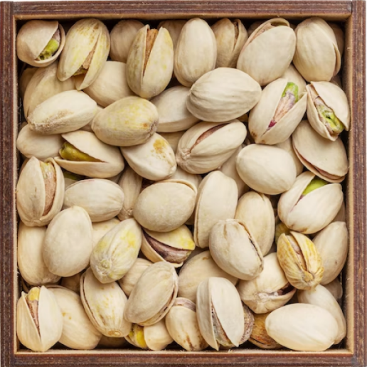 Brush pistachio pesto on bottom of a serving plate and top with arugula 1